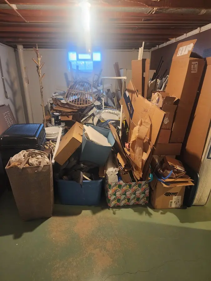 Roll-off dumpster container at job site for Yard Waste Dumpster Rental in Mission Hills